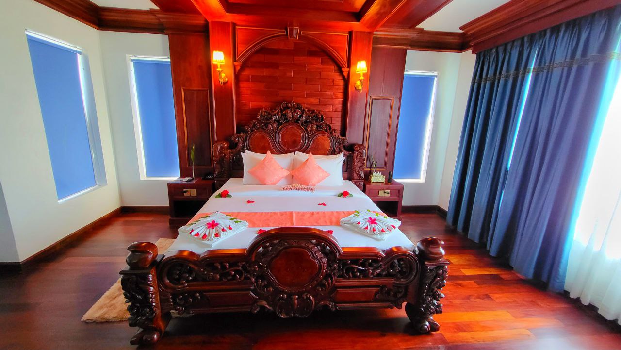 Wooden room with pink romantic setup